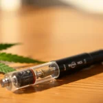 Experience the rich flavors of Muha Meds 2g live resin vape pen with its sleek design and natural essence.